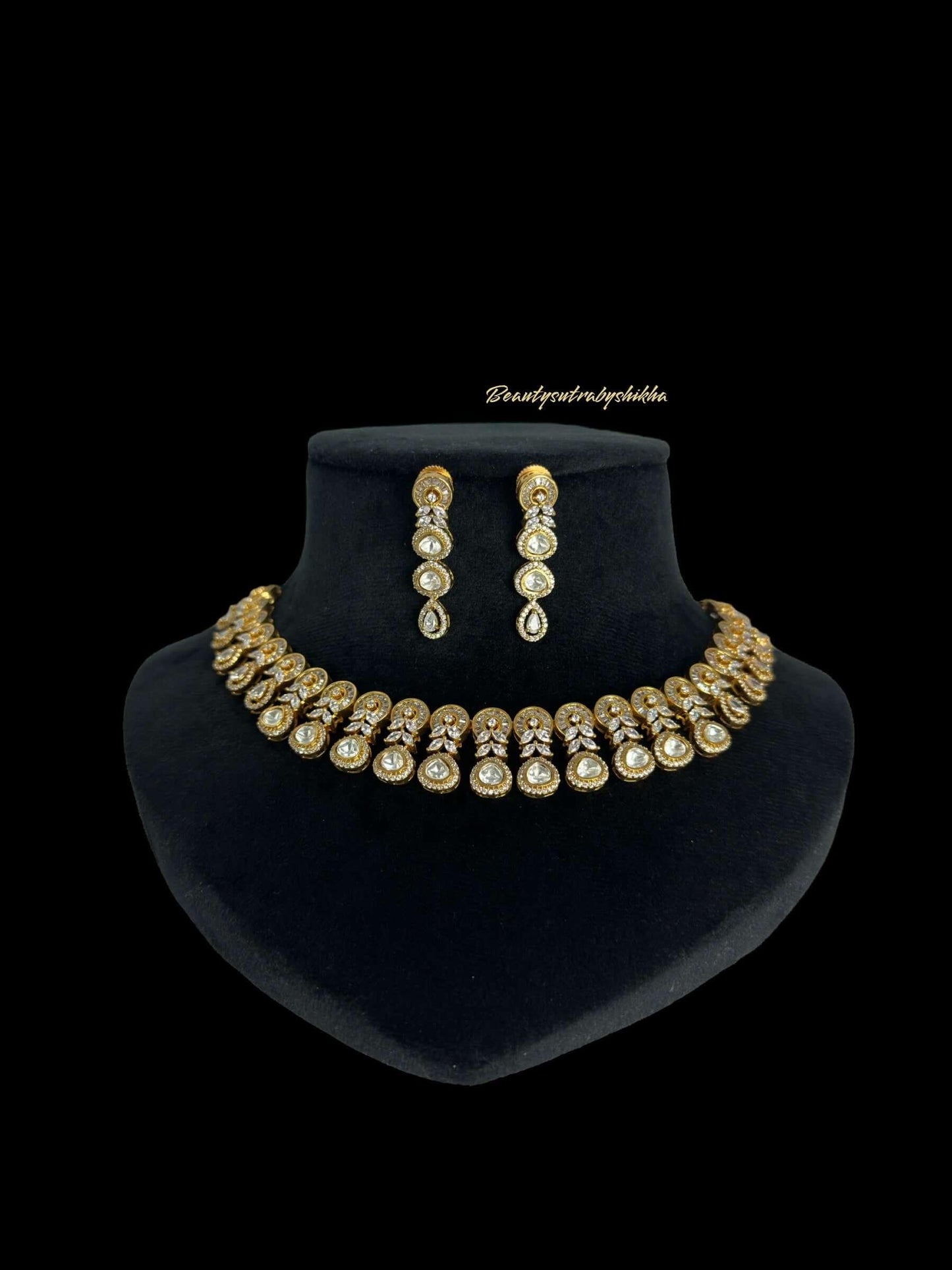 Modern Gold plated and CZ diamonds necklace and earring set - BeautySutra by Shikha