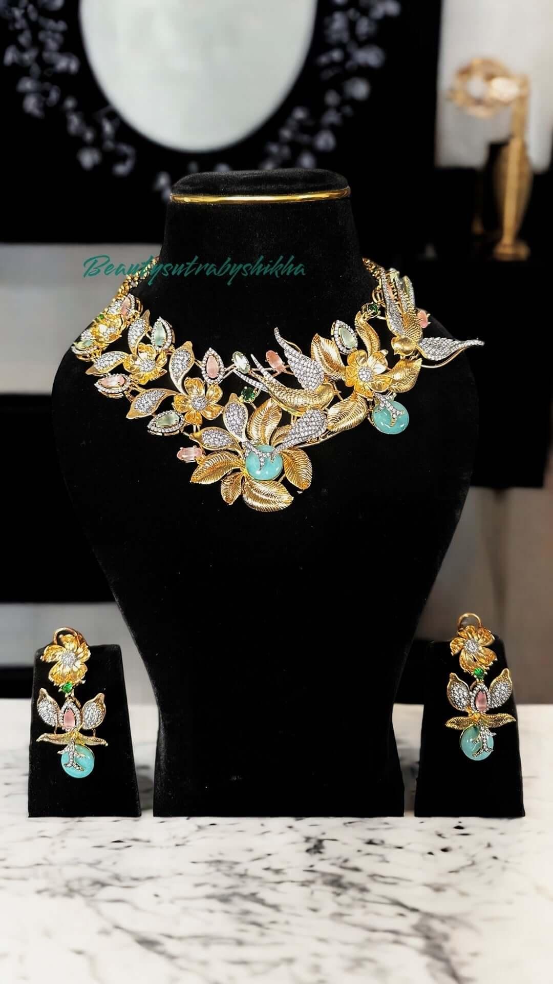 Beautiful Hand Crafted dual tone bird inspired design with turquoise and pink stone set - BeautySutra by Shikha