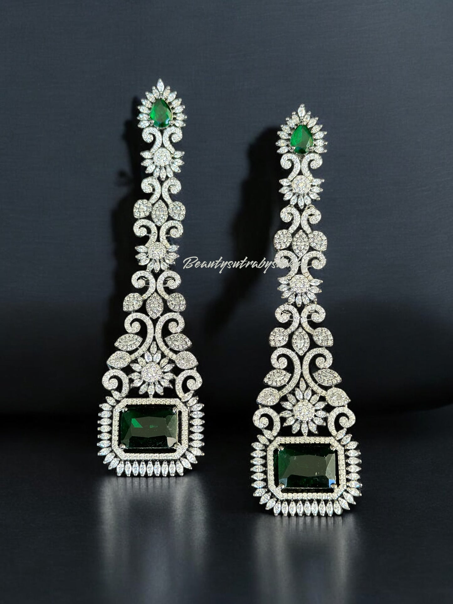 Diamond and emerald earrings