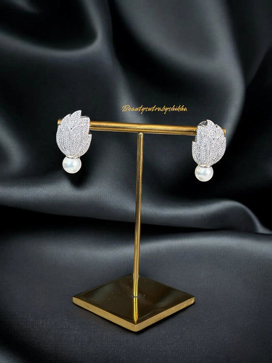Elegant Leaf-Shaped CZ Diamond Earrings with Pearl Drop - Luxurious Jewelry by Beauty Sutra - BeautySutra by Shikha