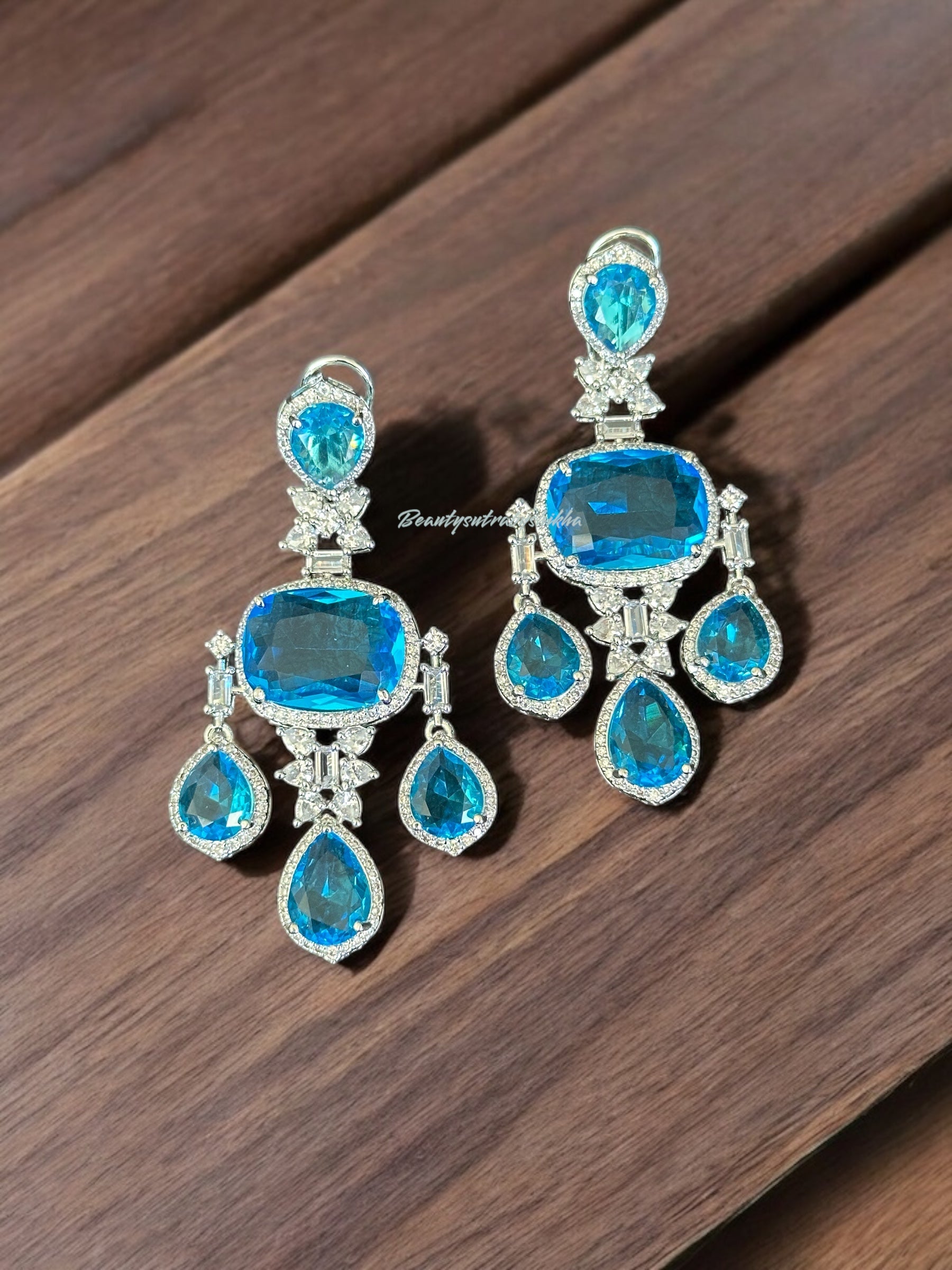 Luxury Blue Statement Earrings – Silver Crystal Dangle Earrings for Weddings & Parties | BeautySutra by Shikha