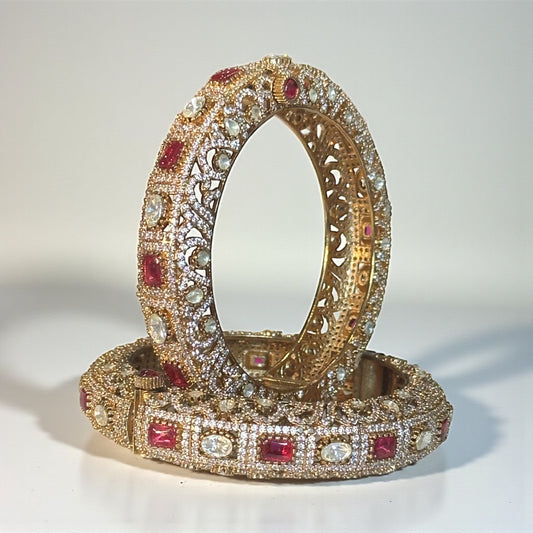 Handcrafted gold-tone kundan bangle with ruby and polki stones for Indian bridal wear